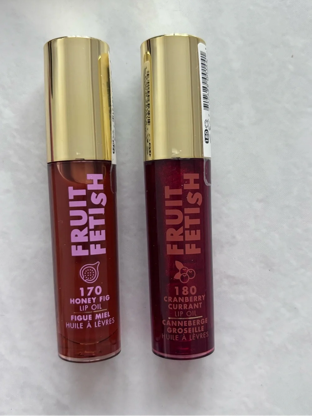 New set of 2 Milani Fruit Fetish Lip Oil Honey Fig & Cranberry Currant